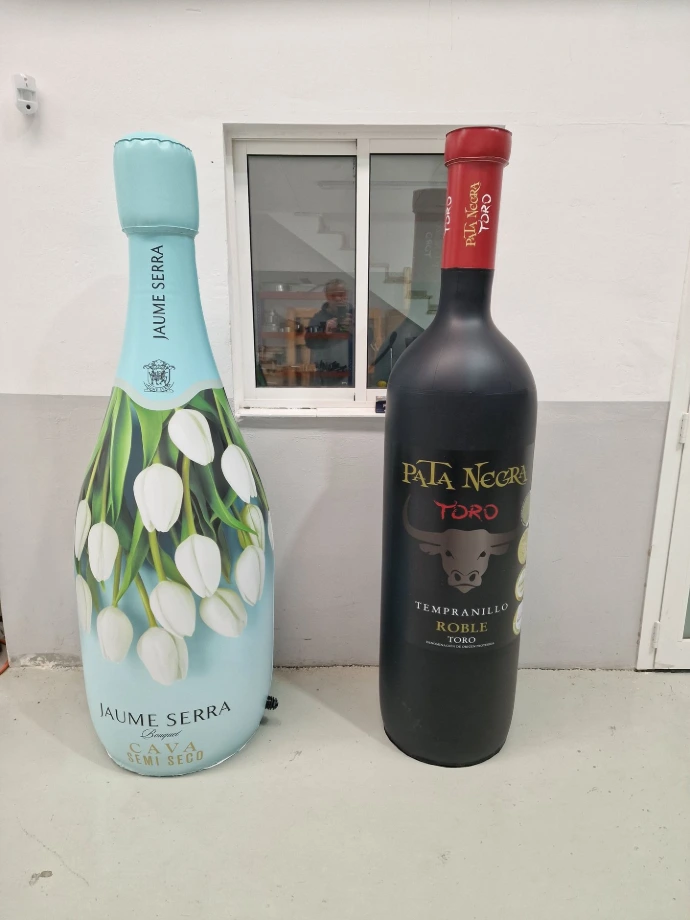 Custom inflatable bottle replicas for events and brand activation by Oxygen Group